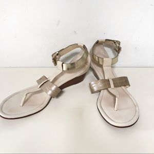 Coach “velvet” sandals t strap style in cream and gold leather